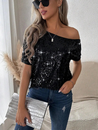 Eine Schulter-Partybluse mit Pailletten | Gerlyn